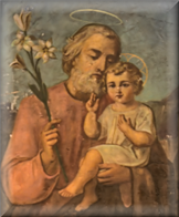 Ikona przedstawiająca Świętego Józefa trzymajęcego w jednej ręce Lilię, a w drugiej Dzieciątkko Jezus.